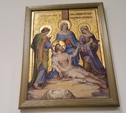 Thirteenth Station: The body of Jesus is taken down from the cross